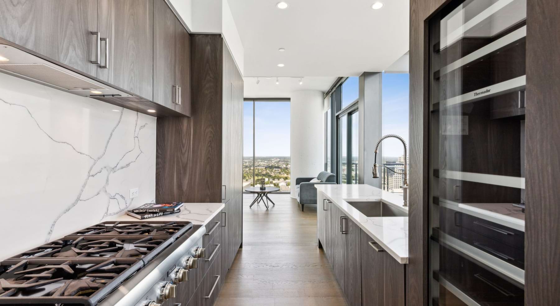 a kitchen with wood cabients