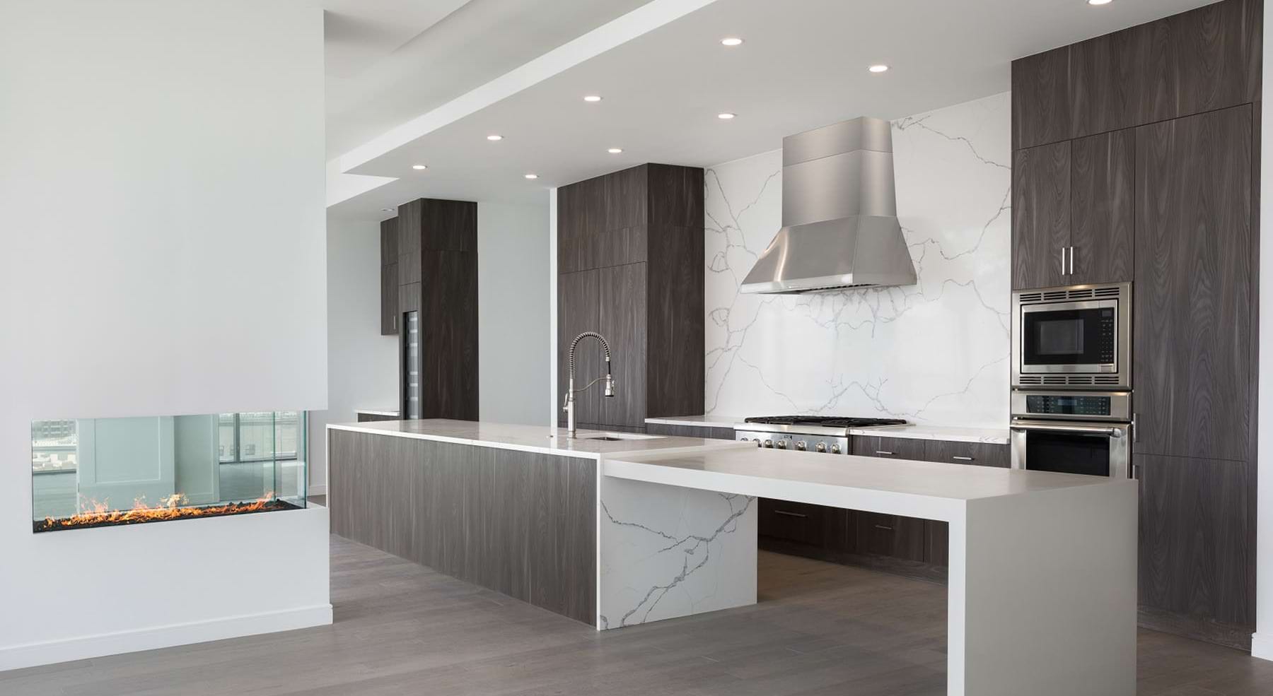 a kitchen with wood cabinets