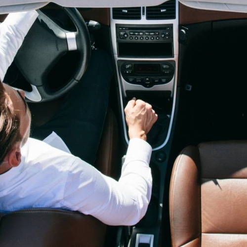 a man driving a car