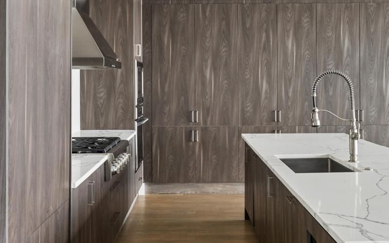 a kitchen with a sink and a stove