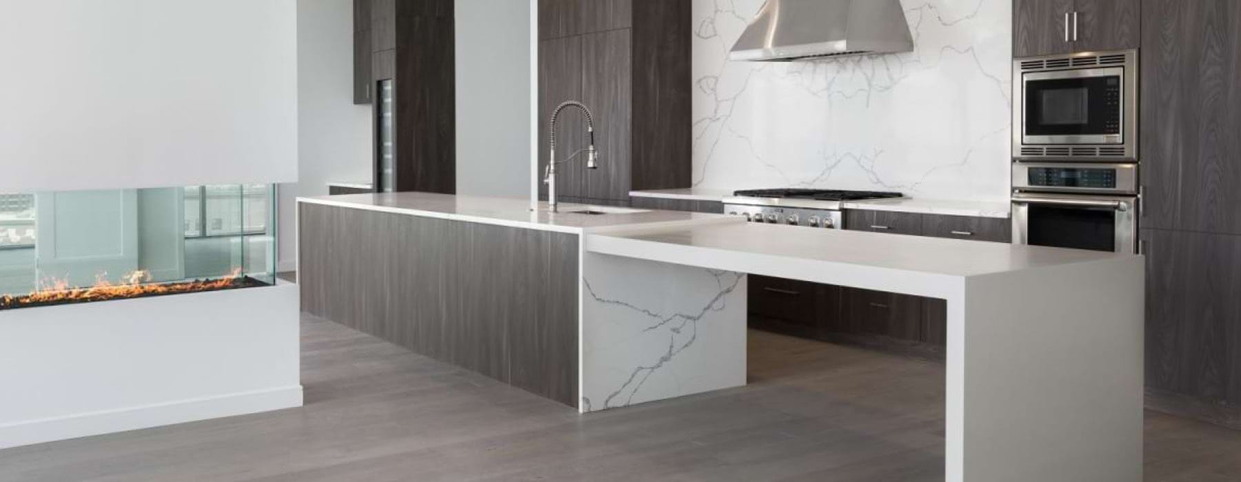 a kitchen with a sink and a stove